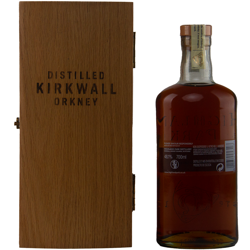 A bottle of Highland Park 30 Year Old Single Malt Whisky stands next to a closed wooden box labeled Distilled Kirkwall Orkney, featuring a sealed cap and clear rear label—an ideal addition to any collector’s whisky selection.