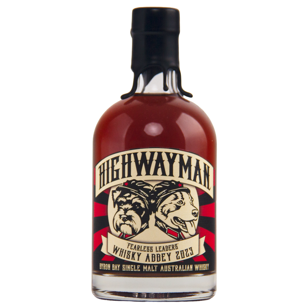 Highwayman Whisky Abbey is a limited-edition Australian single malt featuring an illustrated label with two dogs, bold “Fearless Leaders Whisky Abbey 2023” text, and sealed in sleek black wax.