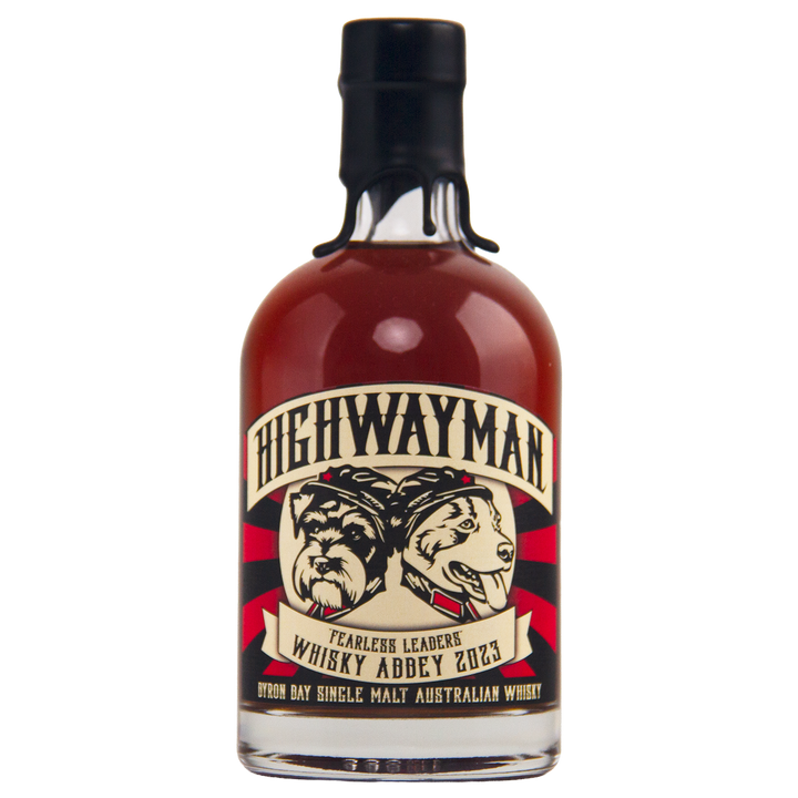 Highwayman Whisky Abbey is a limited-edition Australian single malt featuring an illustrated label with two dogs, bold “Fearless Leaders Whisky Abbey 2023” text, and sealed in sleek black wax.