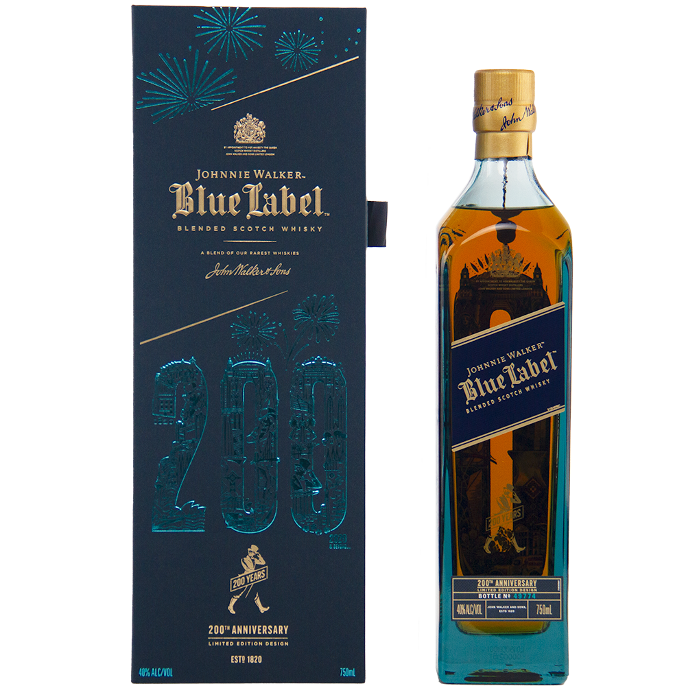 A bottle of Johnnie Walker Blue Label 200th Anniversary sits beside its dark blue commemorative box, adorned with gold accents and fireworks designs.