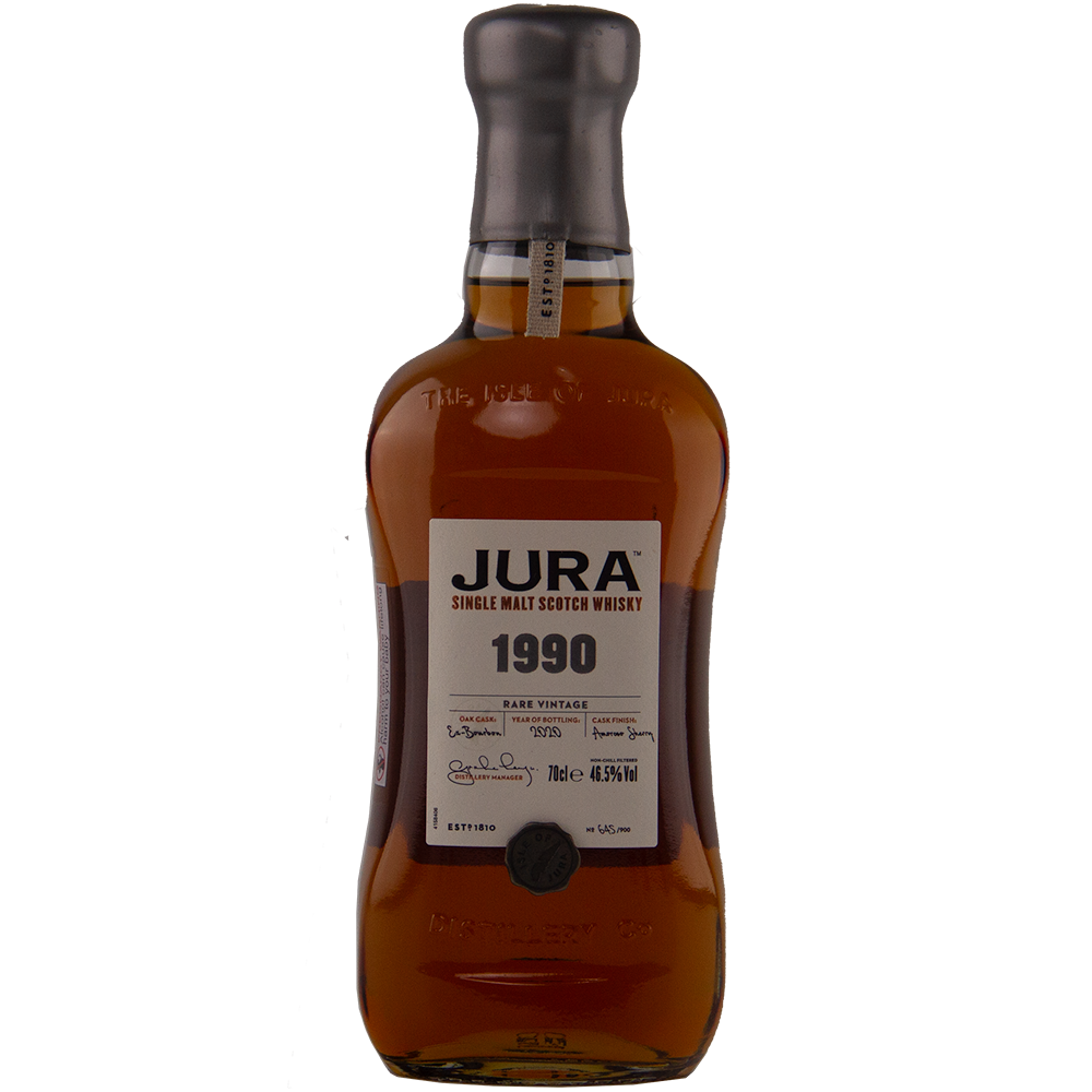 A bottle of Jura 1990 30 Year Old Single Malt Whisky, a collectible single malt with a brown liquid, labeled front, distinctive bottle shape, gray cap, and true limited edition status for whisky connoisseurs.