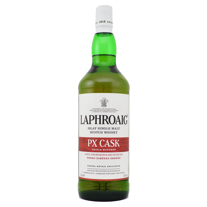 A green bottle of Laphroaig PX Cask Single Malt Scotch Whisky with a white and red label, text, and a seal is displayed against a plain white background.