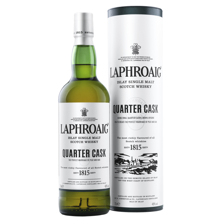 A bottle of Laphroaig Quarter Cask Single Malt Scotch Whisky stands beside its white cylindrical packaging, both displaying black and grey text and a distillery illustration.