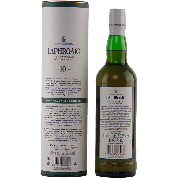 A green bottle of Laphroaig 10 Year Old Cask Strength Batch 15 stands beside its cylindrical packaging, both featuring the brand name and product details. The white label highlights this classic peated single malt.