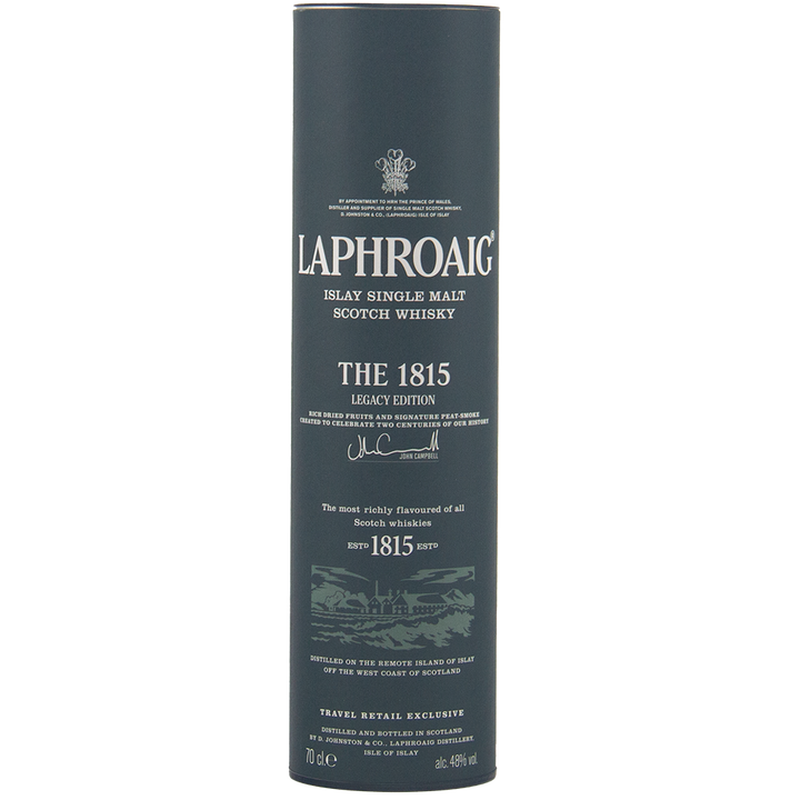 A cylindrical dark green tin holds Laphroaig 1815 Legacy Edition Single Malt Whisky, with white text detailing the product and branding—a tribute to peated whisky craftsmanship.