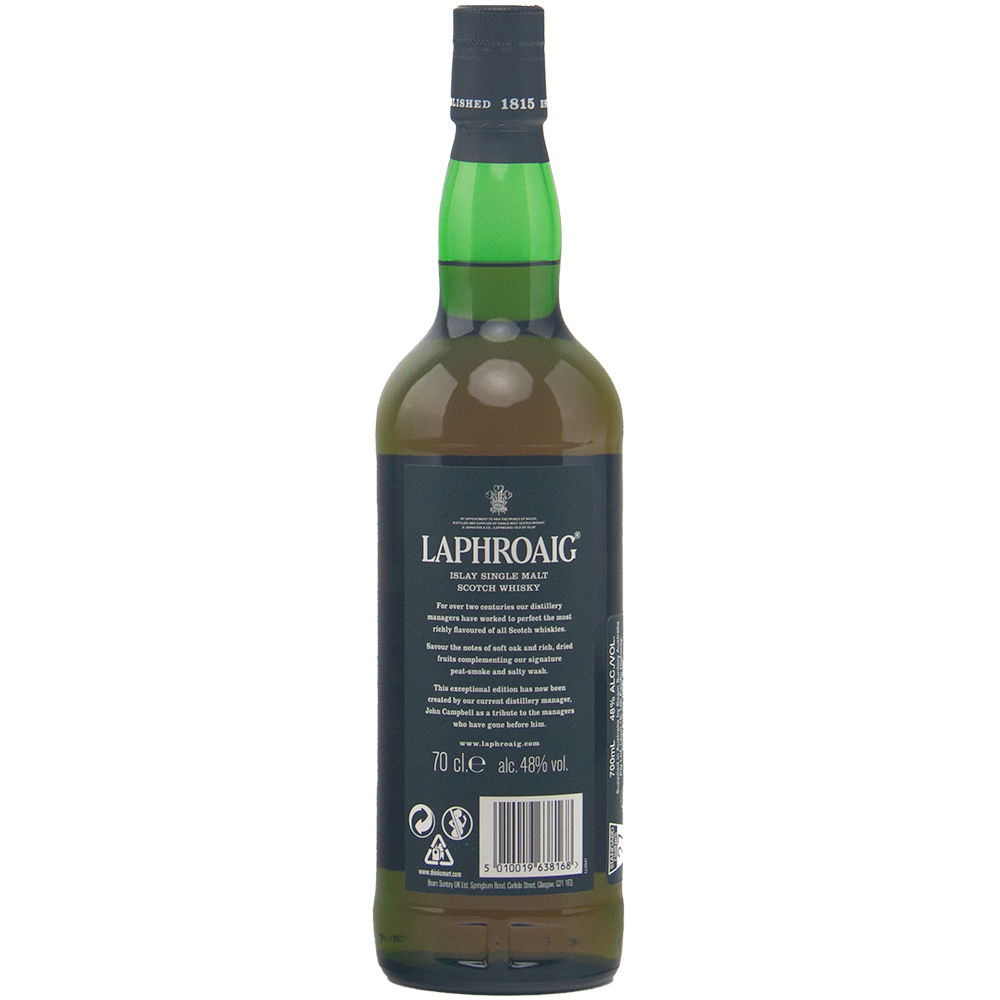 A green glass bottle of Laphroaig 1815 Legacy Edition Single Malt Whisky stands upright, back label with white text visible, black cap on top, photographed against a plain, light background.