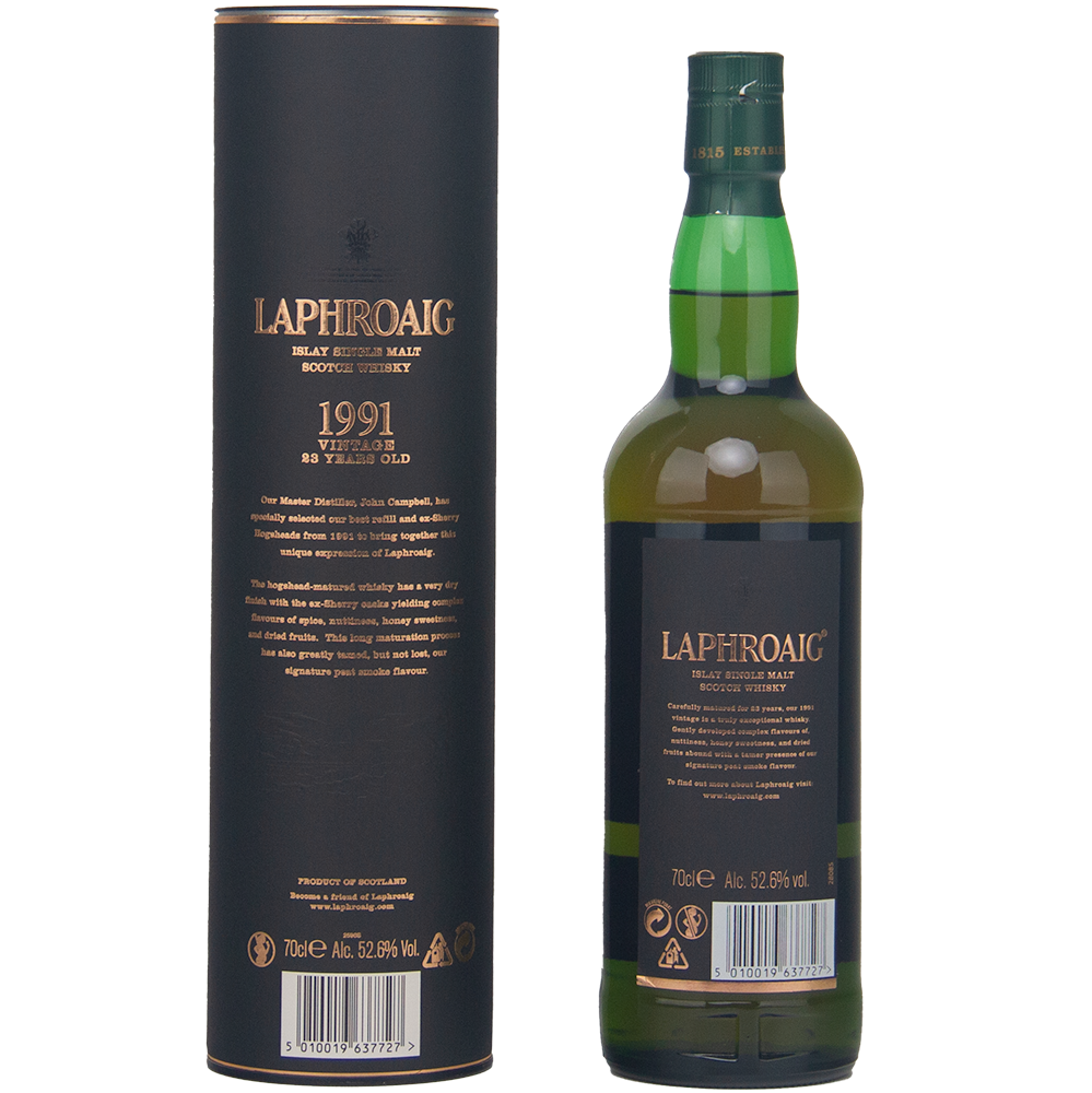 A bottle of Laphroaig 1991 Vintage 23 Year Old Single Malt Whisky stands by its cylindrical box, both adorned with gold text on a dark background. This collector’s edition is bottled at cask strength—52.6% ABV.