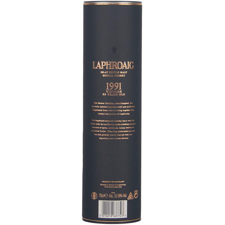A tall, cylindrical black container for Laphroaig 1991 Vintage 23 Year Old Single Malt Whisky, with gold text and detailing and cask strength information printed on the front.