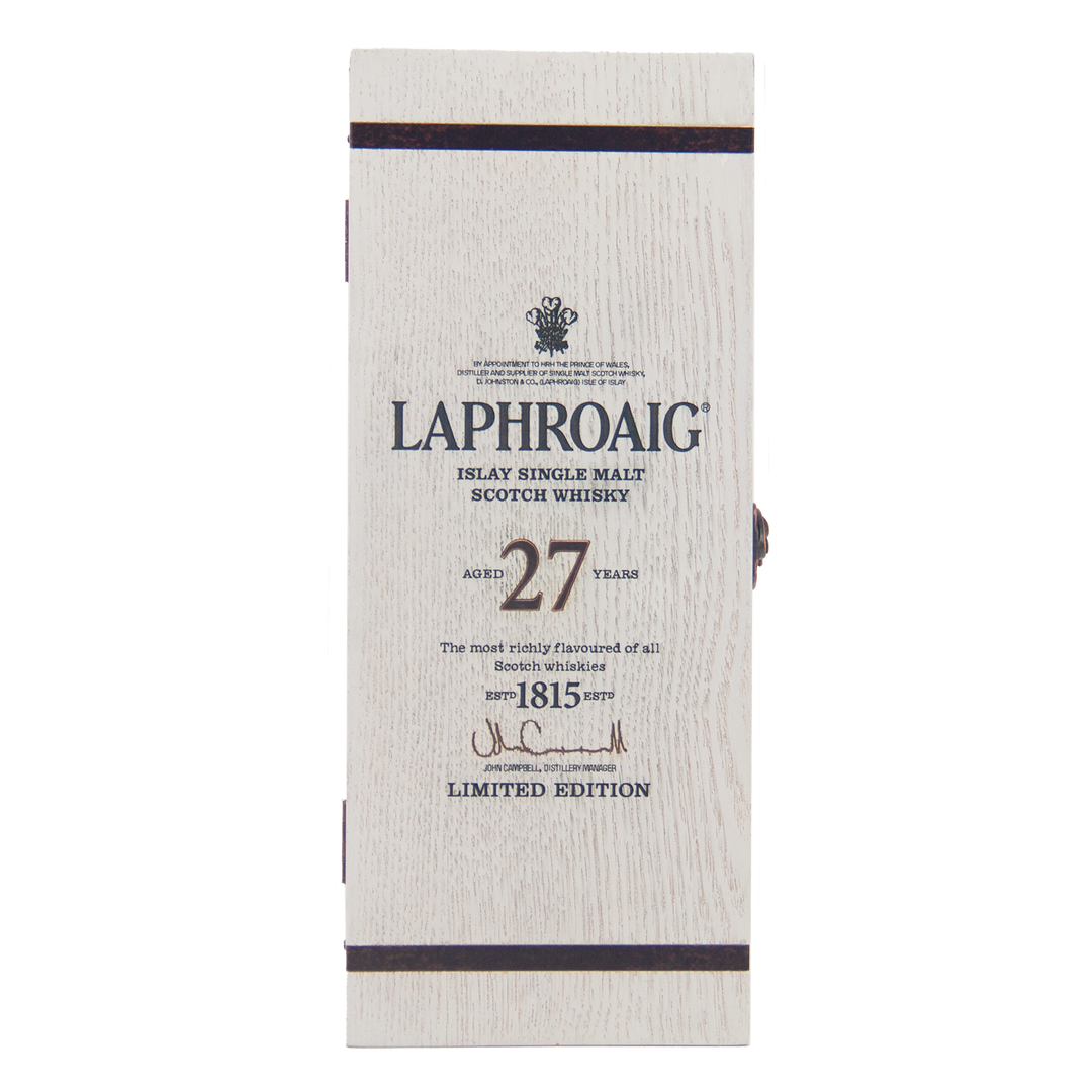 A white wooden box with black-printed details, including "Laphroaig 27 Year Old Single Malt Whisky" and "Limited Edition 1815"—an investment-grade whisky ideal for discerning collectors.