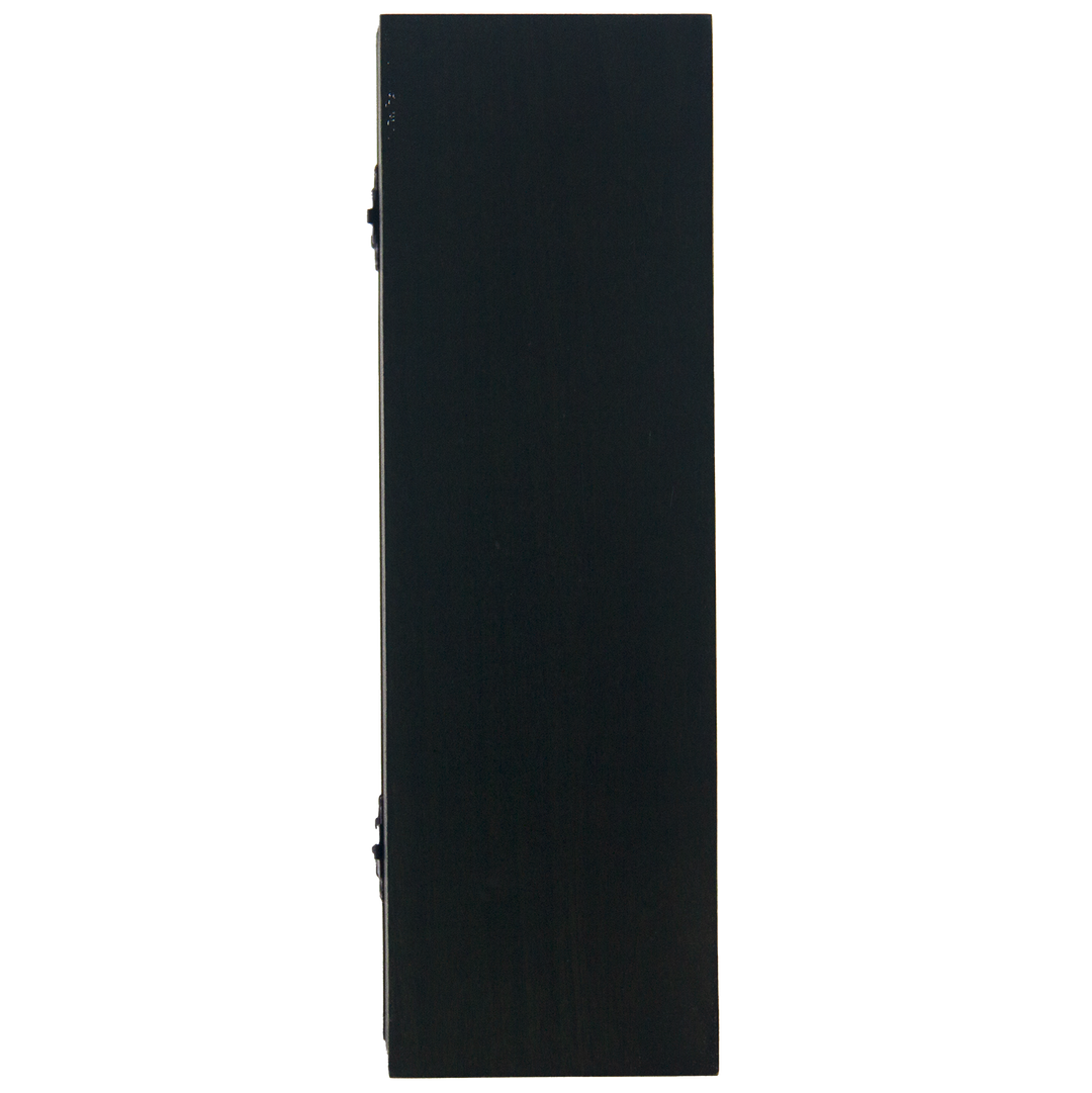 A tall, rectangular black object stands vertically against a white background—an understated side view that suggests it could be the rare Laphroaig 30 Year Old Limited Edition Single Malt Whisky.