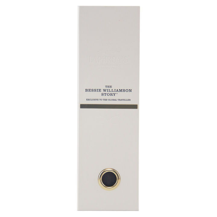 A tall, rectangular white box with gold and navy accents labeled "The Bessie Williamson Story," designed exclusively for the Laphroaig Bessie Williamson Story 25 Year Old Limited Edition Whisky from the renowned Scotch distillery.