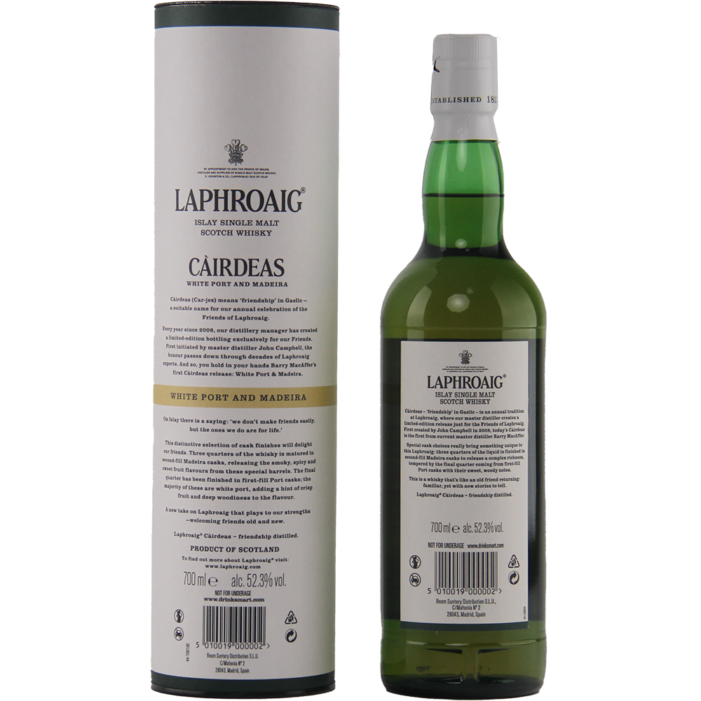 A bottle of Laphroaig Cairdeas White Port and Madeira whisky stands beside its cylindrical white and grey box, both featuring detailed product information and branding in black text.