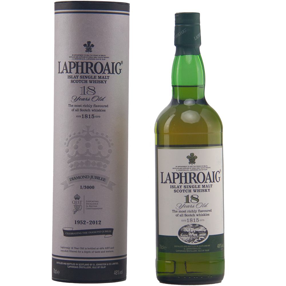 A bottle of Laphroaig Diamond Jubilee 18 Year Old Limited Edition stands by its cylindrical box, both with commemorative labels marking 1952-2012—a rare collectible whisky for discerning enthusiasts.