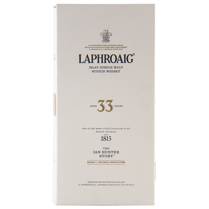 A white box of Laphroaig Ian Hunter Series Book 3 33 Year Old Single Malt Whisky features black text, gold accents, and showcases The Ian Hunter Story: Source Protector, making it a true collector's item.