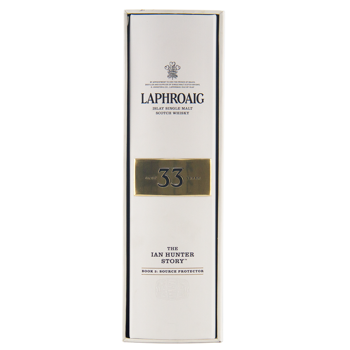 The Laphroaig Ian Hunter Series Book 3 33 Year Old Single Malt Whisky comes in a white box with “The Ian Hunter Story” and “Book 3: Source Protector” in bold black and gold lettering, making it a collectible whisky.