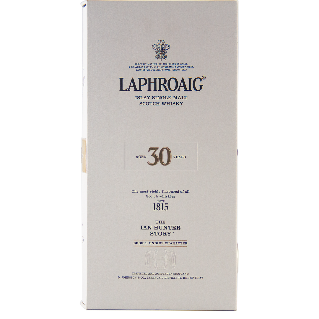 Front view of a white box of Laphroaig Ian Hunter Story Book 1 30 Year Old Single Malt Whisky, featuring aging details, The Ian Hunter Story text, and decorative branding.