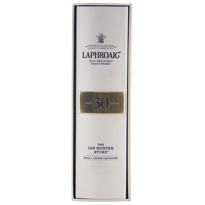 A white box branded Laphroaig Ian Hunter Story Book 1 with black text contains a bottle of the coveted 30 Year Old Single Malt Scotch Whisky from this collector’s series.