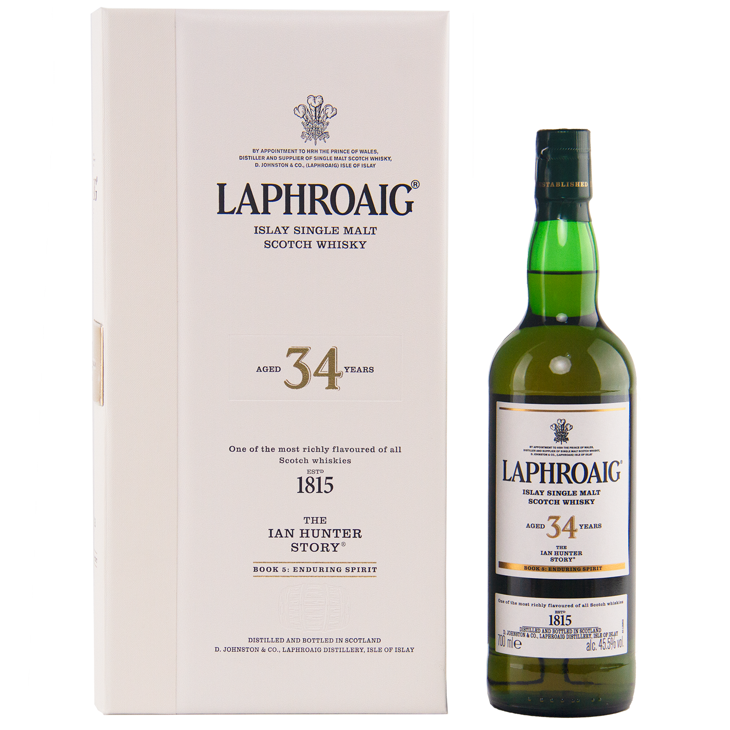 A bottle of Laphroaig Ian Hunter Story Book 5 34 Year Old Single Malt Whisky stands next to its white box, both featuring black and gold text that highlights the exceptional heritage and character of this 34-year-old Islay malt.