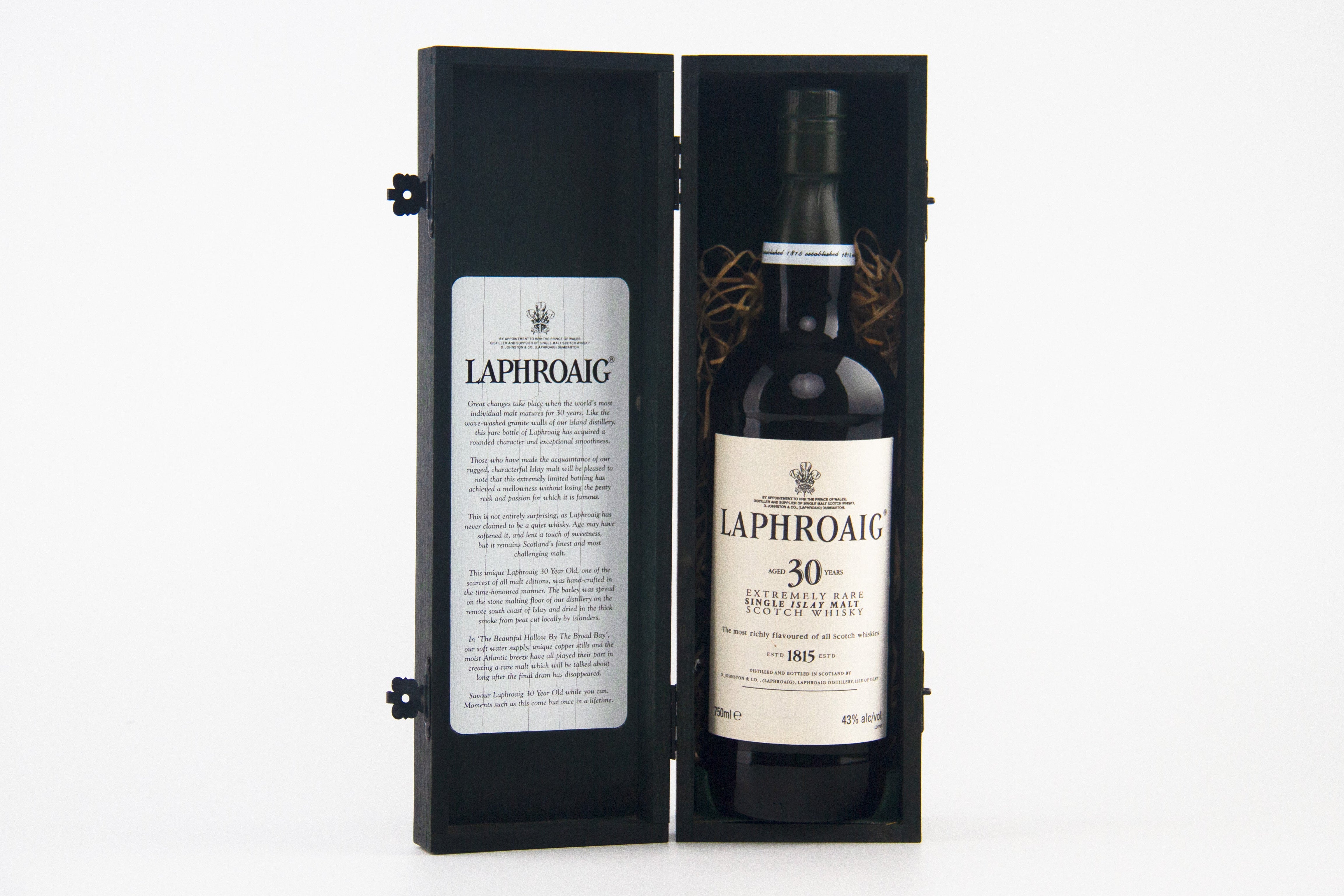 Laphroaig 30-year-old extremely rarewhisky bottle in a black box on a white background