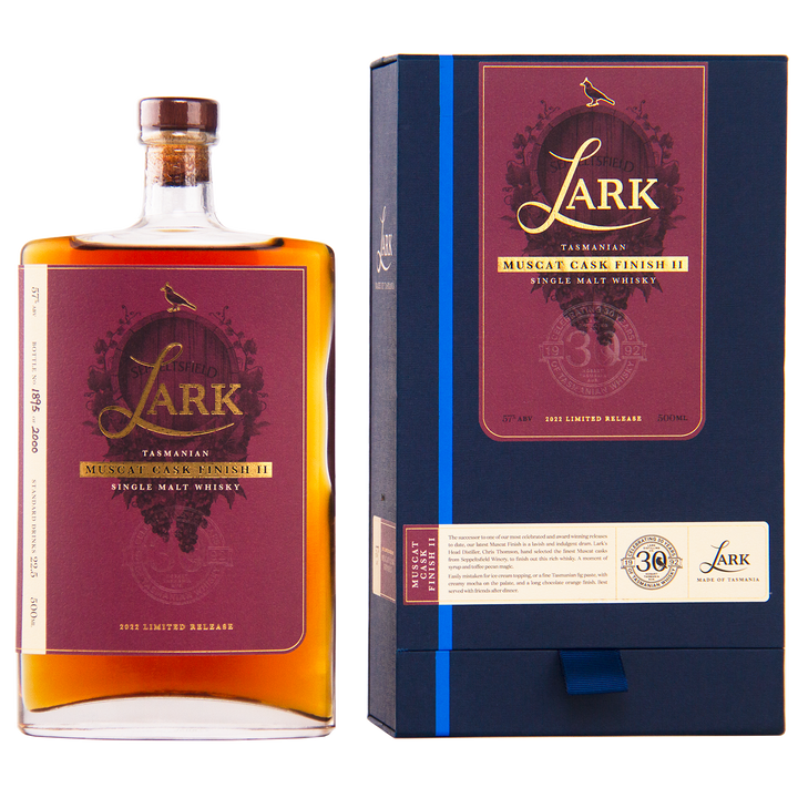 A bottle and box of Lark Muscat Cask Finish II Single Malt Whisky, featuring a rectangular bottle with a maroon label and a dark blue box accented in gold and maroon.