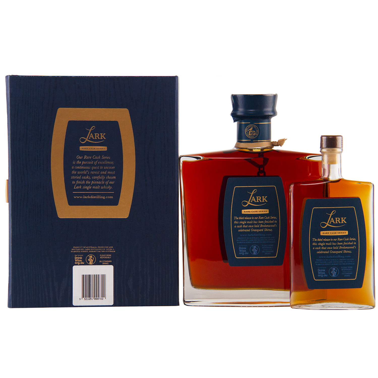 Two bottles of Lark Brokenwood Graveyard Shiraz Rare Cask Single Malt Whisky stand beside a navy blue box. The amber Tasmanian whisky features gold-accented navy labels from the Rare Cask Series.