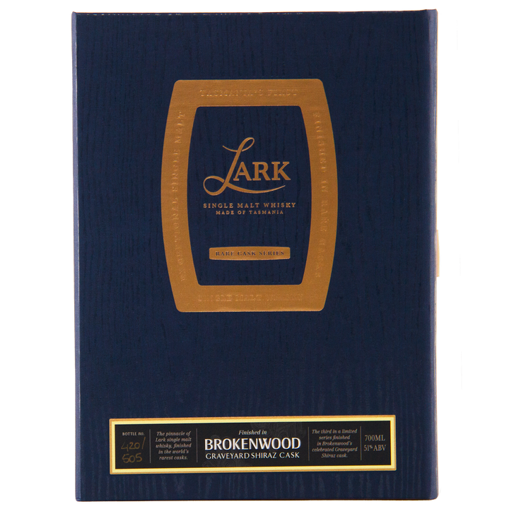 A dark blue box with gold text and accents features a barrel outline framing Lark Brokenwood Graveyard Shiraz Rare Cask Single Malt Whisky, with a gold "Rare Cask Series" label at the bottom.