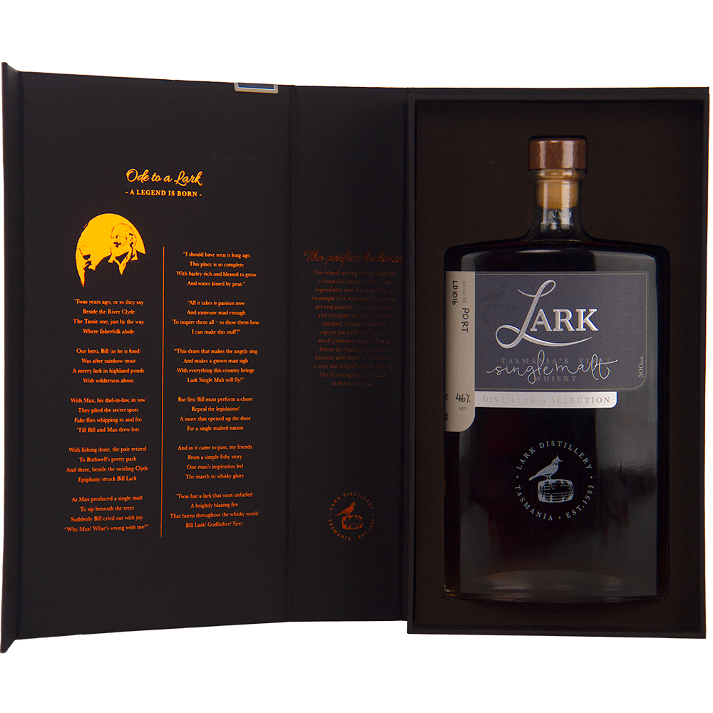 A large bottle of Lark Distiller's Selection LD1016 Single Malt Whisky sits in a black presentation box, featuring gold and orange text and illustrations on the inside cover.