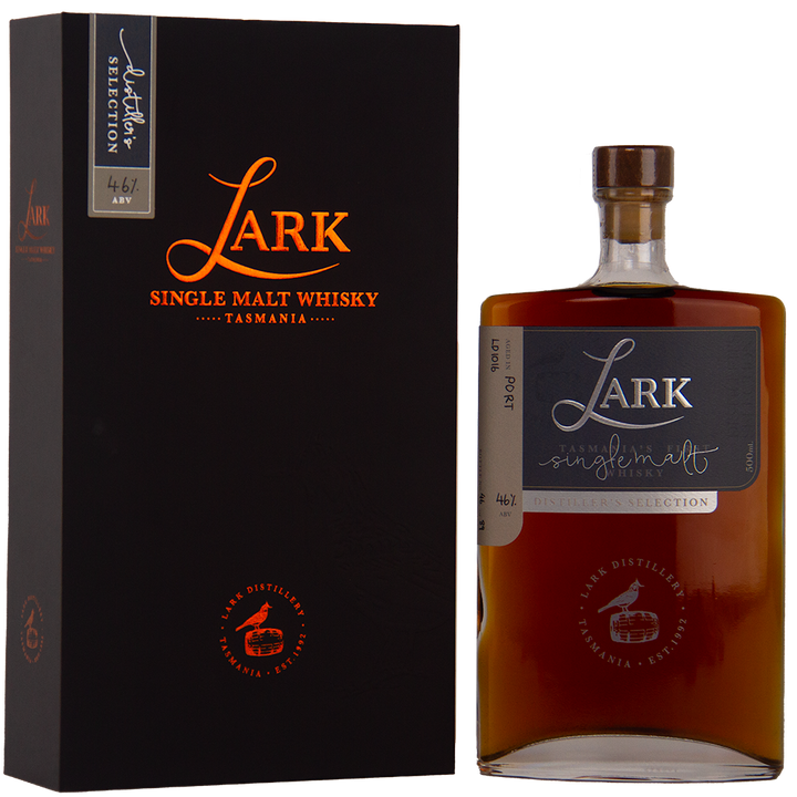 A bottle of Lark Distiller's Selection LD1016 Single Malt Whisky sits by its black box, both displaying orange and white text with refined branding and a circular seal. This limited whisky features a rich amber hue.