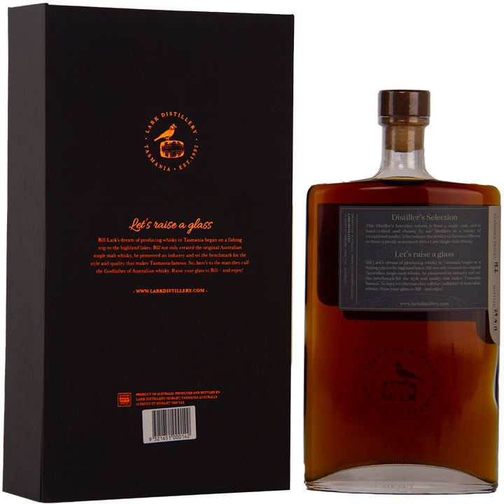 A rectangular bottle of Lark Distiller’s Selection LD1016 Single Malt Whisky with a cork and label stands beside a matching black box featuring the Lark Distillery logo and orange text, “Let’s raise a glass.”.