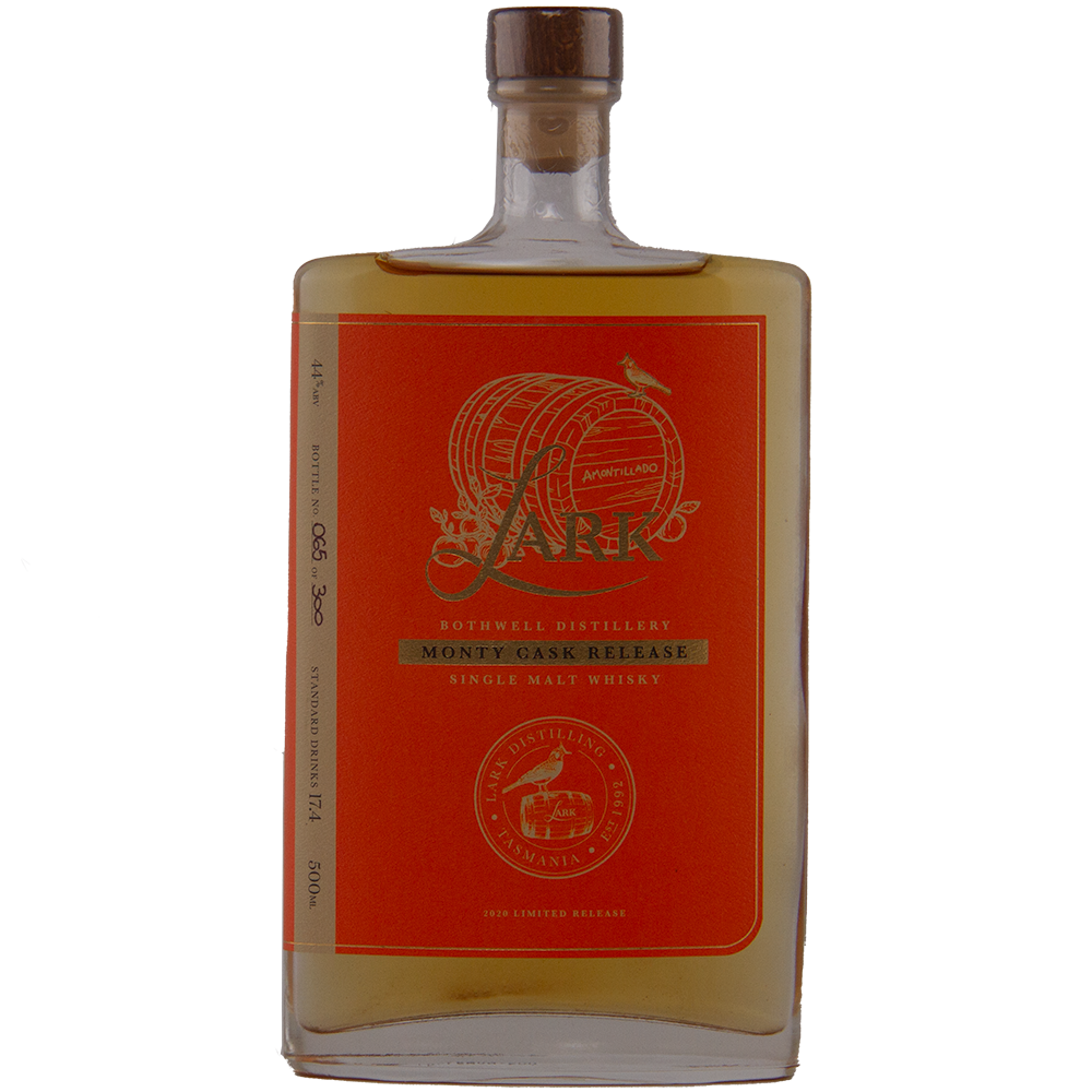 A rectangular bottle of Lark Monty Cask Release Single Malt Whisky with a red and gold label contains amber liquid. This wooden-capped, limited edition 2020 release is matured in Amontillado cask.