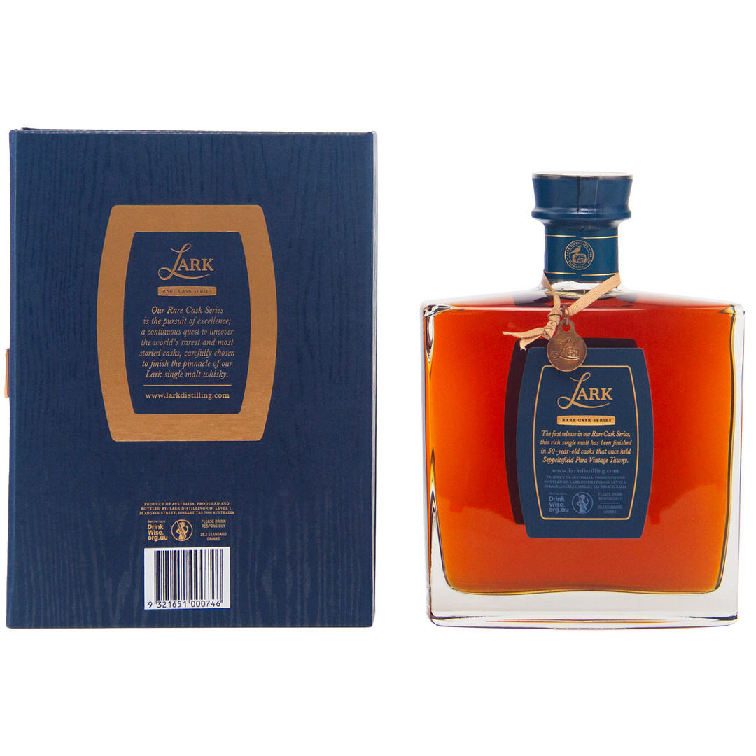 A square bottle of Lark Seppeltsfield Para 50 II Rare Cask Single Malt Whisky with a blue and gold label stands beside its matching box, sealed with a decorative gold medallion and ribbon—an exquisite Australian whisky.