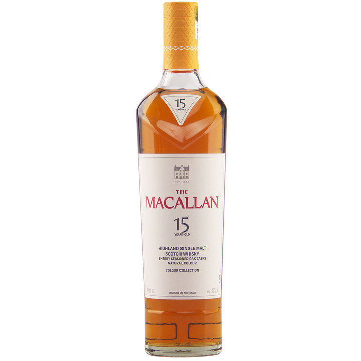 A bottle of The Macallan Colour Collection 15 Year Old Single Malt Scotch Whisky with a gold cap, white label, and red and gold lettering stands upright against a plain white background.