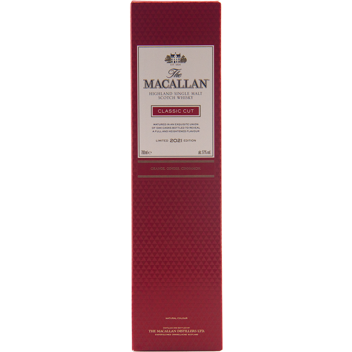 A tall, rectangular red box of The Macallan Classic Cut 2021 Release Single Malt Scotch Whisky features gold and white text, cask strength, and highlights tasting notes of orange, ginger, and cinnamon.