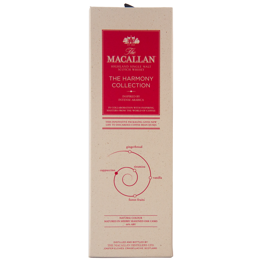 A beige box of The Macallan Harmony Collection Intense Arabica Single Malt Scotch Whisky features red text, a spiral diagram listing gingerbread, espresso, cinnamon, vanilla, and fresh fruit flavors, and emphasizes coffee-inspired tasting notes.
