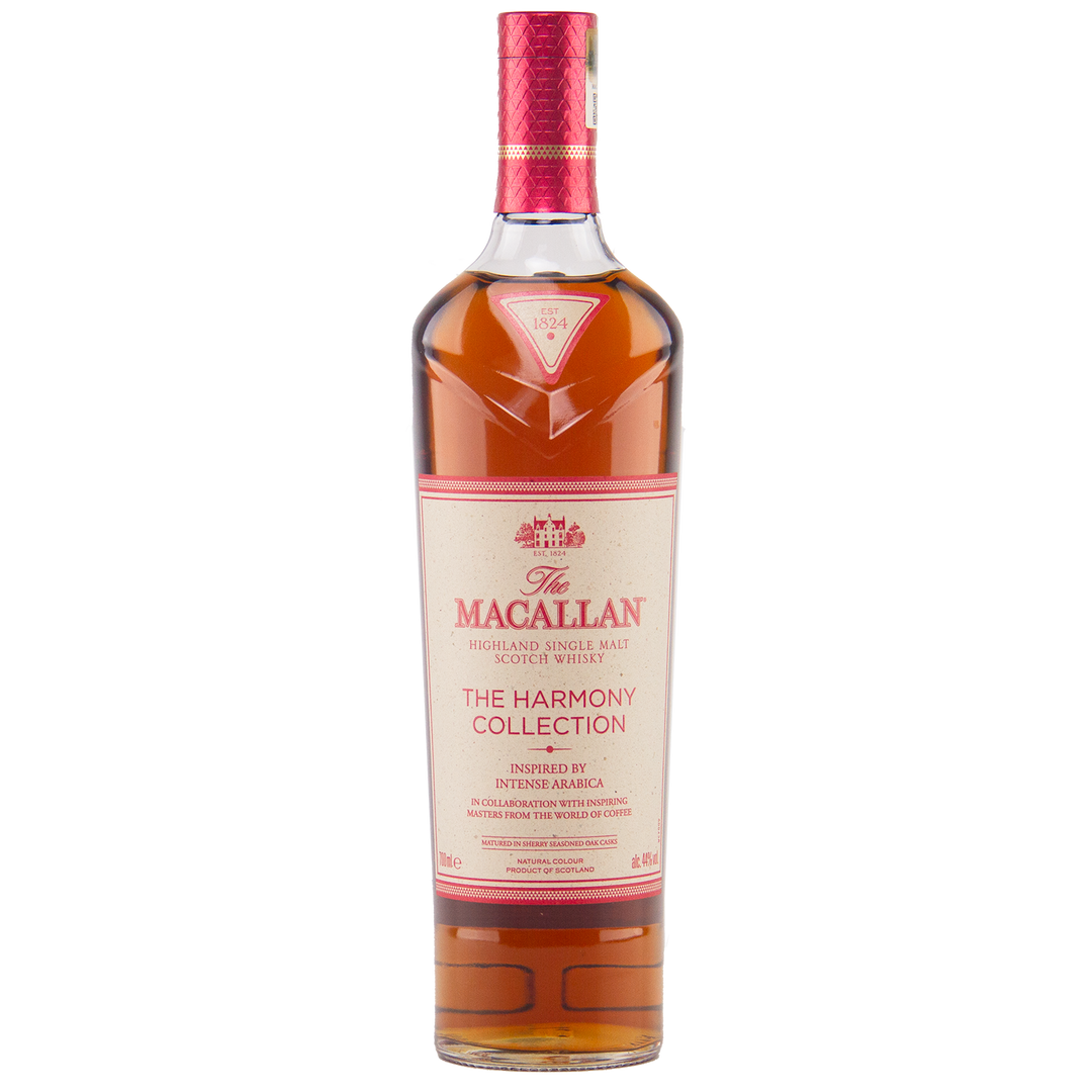A bottle of The Macallan Harmony Collection Intense Arabica Single Malt Scotch Whisky, coffee-inspired, with a cream and red label, gold accents, a red foil cap, and amber-colored whisky inside.