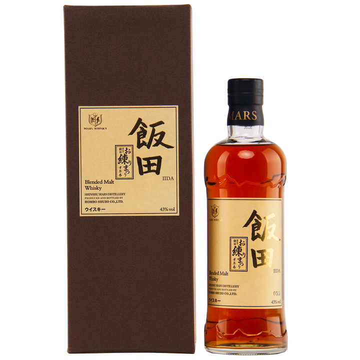 A bottle of Mars Blended Malty Whisky in a brown box, both featuring gold labels with Japanese and English text and the Mars Distillery logo. Collectible Japanese whisky presentation.
