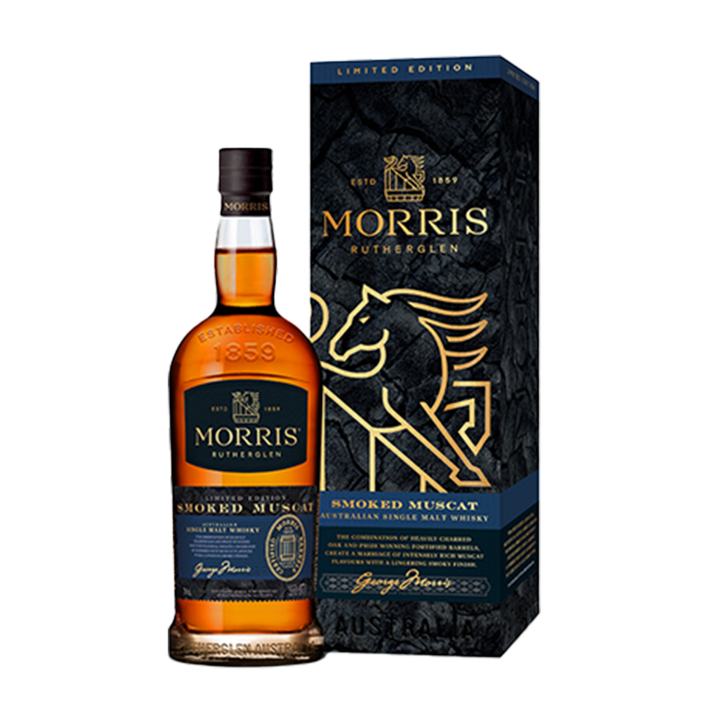A bottle of Morris Limited Edition Smoked Muscat Australian Single Malt Whisky stands beside its matching box, which is dark with gold accents, a stylized bull illustration, and product details.