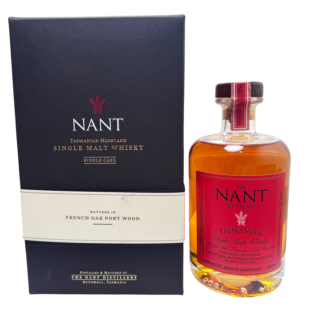 A bottle of Nant Tasmanian single malt whisky next to its dark navy blue presentation box, photographed on a clean white background.