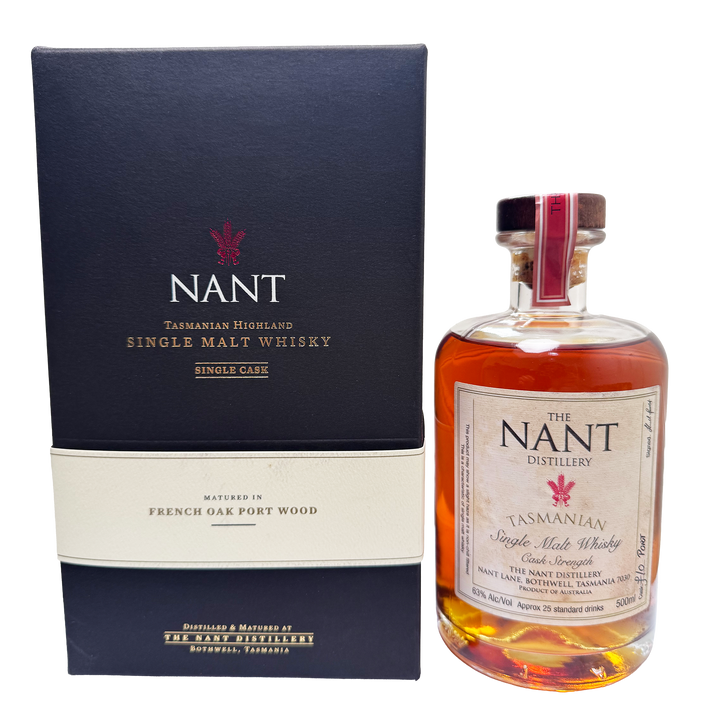 A bottle of Nant Distillery The Nant Single Malt Whisky next to its dark navy blue presentation box on a white background.