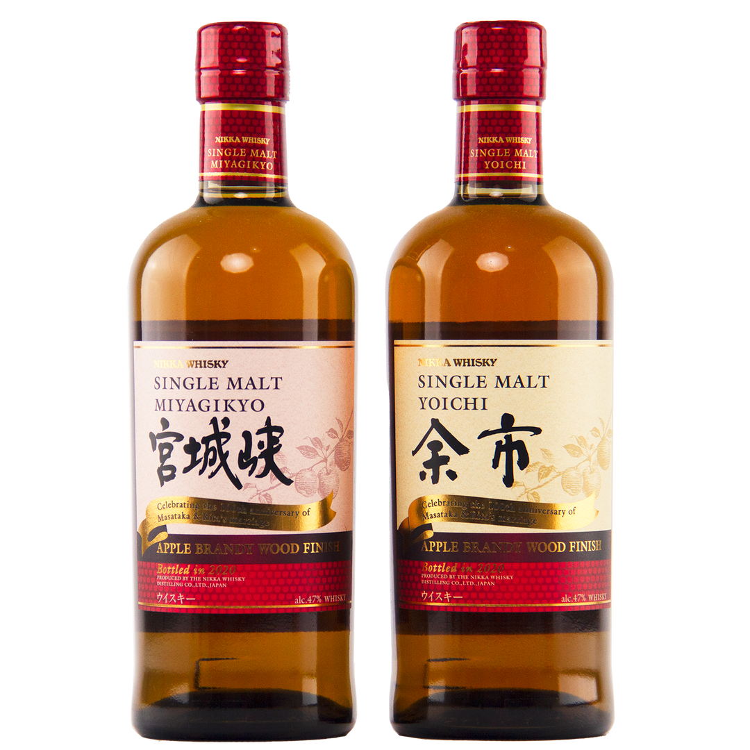 The Nikka Yoichi & Miyagikyo 2020 Apple Brandy Wood Finish (2 Bottle Set) features both bottles side by side with red caps and gold-accented labels, showcasing exceptional Japanese whisky craftsmanship.