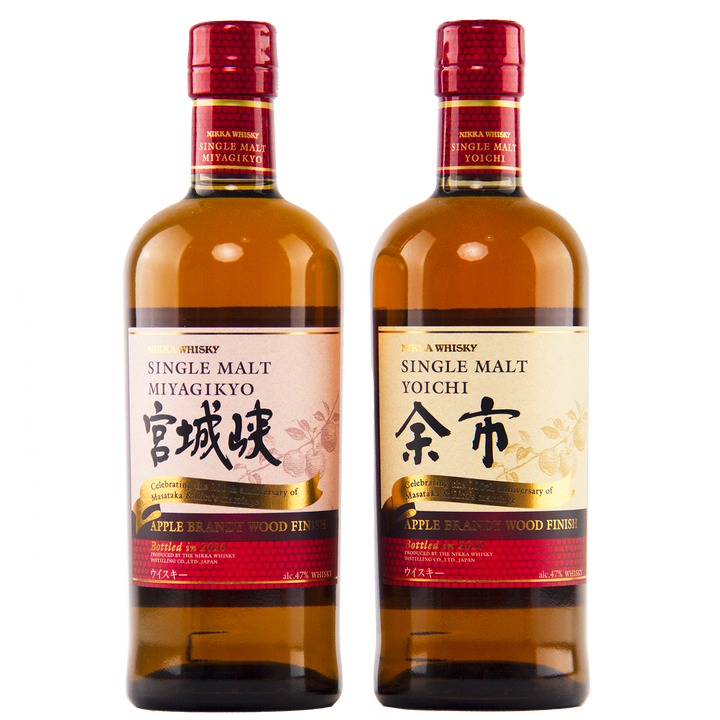 The Nikka Yoichi & Miyagikyo 2020 Apple Brandy Wood Finish (2 Bottle Set) features both bottles side by side with red caps and gold-accented labels, showcasing exceptional Japanese whisky craftsmanship.