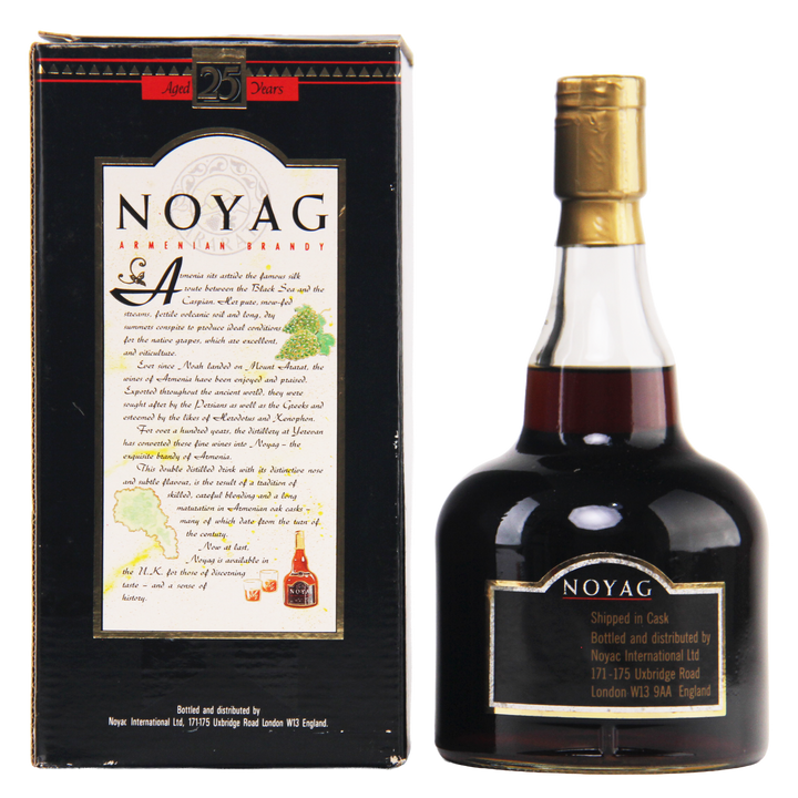 Bottle and packaging of Noyag brandy on a white background
