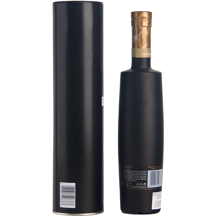A matte black bottle of Bruichladdich Octomore 08.4 Single Malt Whisky stands beside its matching tall, black cylindrical container. Both feature minimal labels and visible barcodes on the back.
