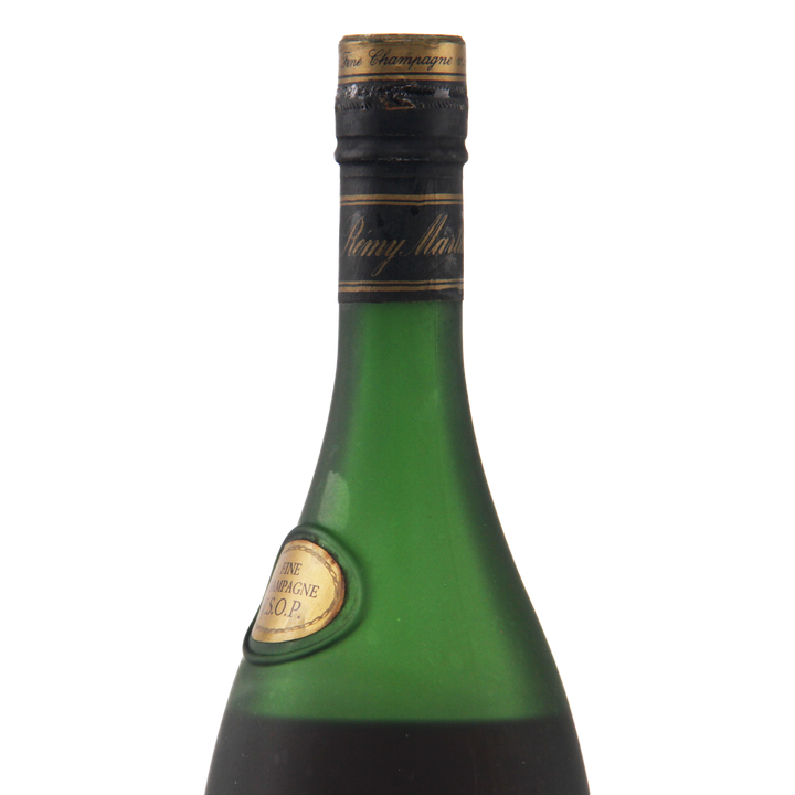 Green wine bottle with a cork on a white background