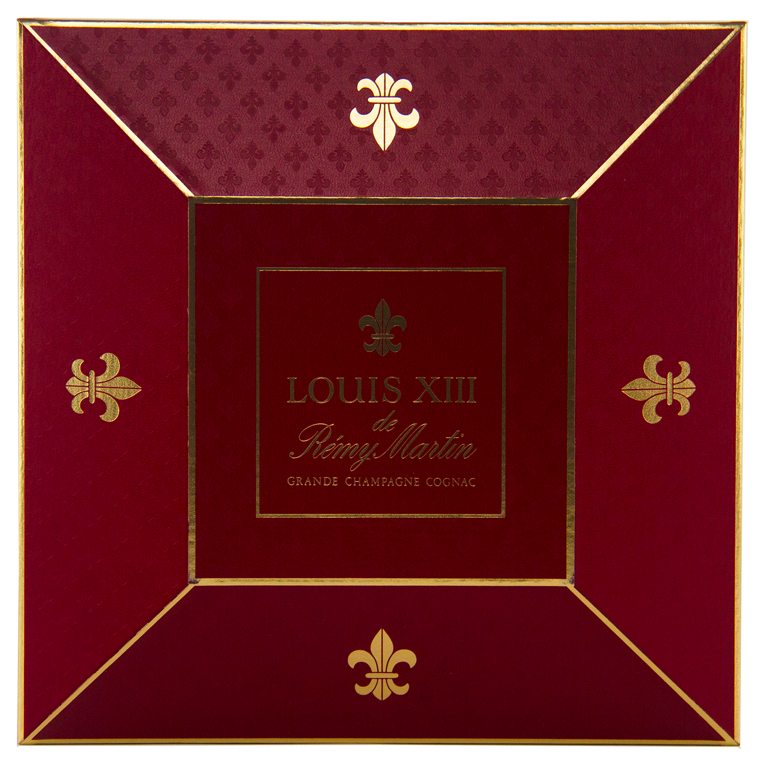 A red and gold box with "Rémy Martin Louis XIII 1980s Edition Cognac Grande Champagne 700mL" at the center, gold fleur-de-lis on each corner—crafted to house the iconic Baccarat crystal decanter of this legendary French Cognac.