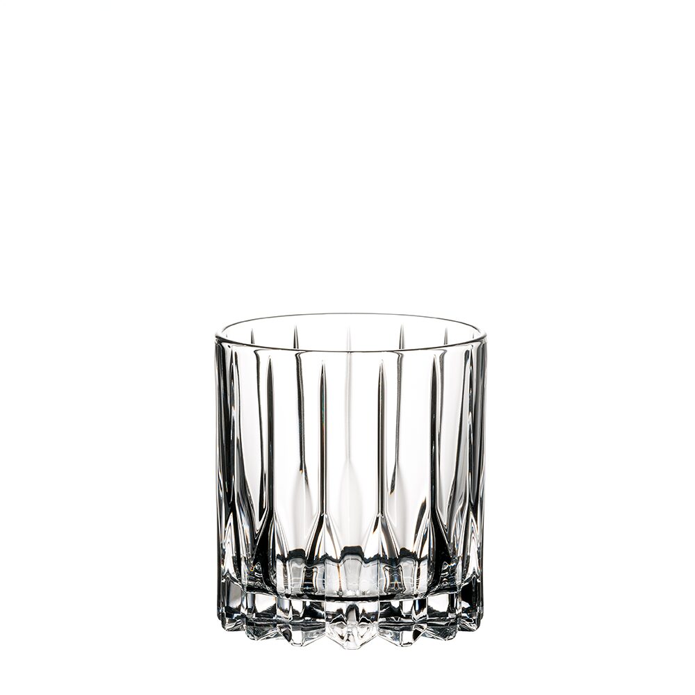 The RIEDEL Neat Whisky Glass Set of 2 features clear tumblers with vertical, faceted lines and thick bases—perfect for spirit-focused cocktails—shown empty against a plain white background.