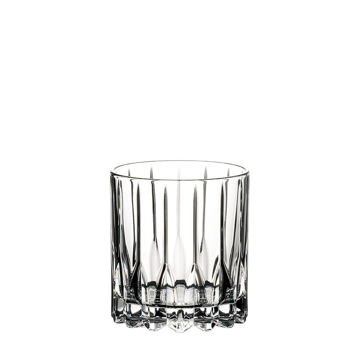 The RIEDEL Neat Whisky Glass Set of 2 features clear tumblers with vertical, faceted lines and thick bases—perfect for spirit-focused cocktails—shown empty against a plain white background.