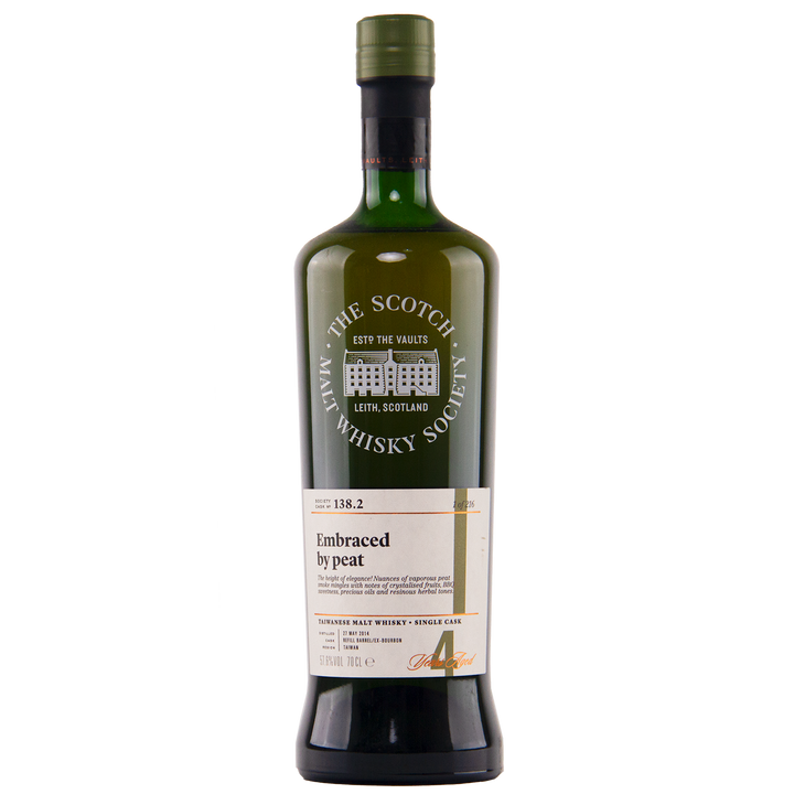 A green bottle of SMWS 138.2 Embraced by Peat, a peated whisky with a dark cap, stands on a white background, displaying The Scotch Malt Whisky Society label.