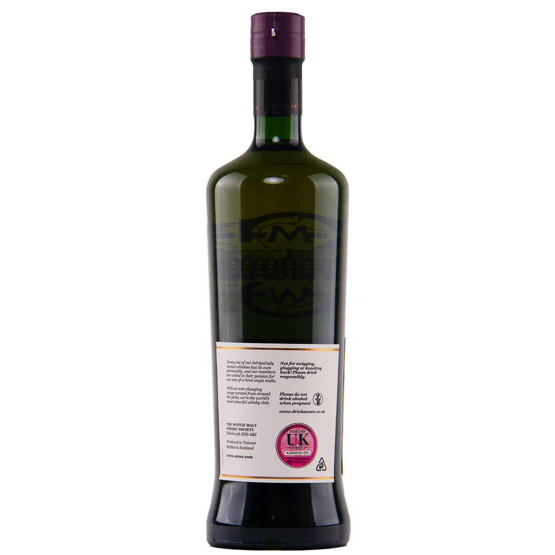 A dark green glass bottle with a tall neck and purple cap is shown from the back. The pink UK duty stamp and recycling icon on the label identify it as SMWS 138.5 Delicate Masculinity whisky from the Scotch Malt Whisky Society. Plain white background.