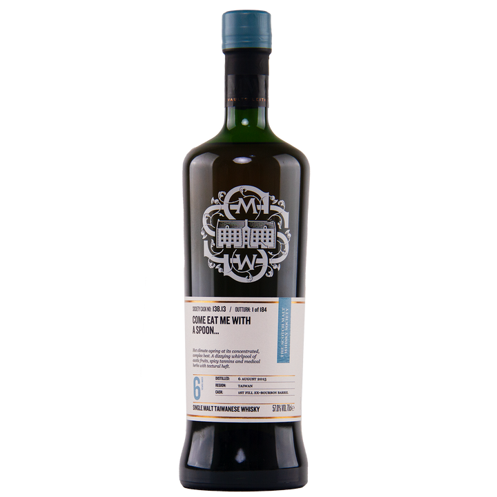 A dark green bottle of SMWS Cask No. 138.13 Come Eat Me With a Spoon…, with a white and blue label and logo, is shown against a plain white background.